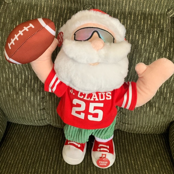 Cuddle Barn Santa Claus Plush Toy with Football - Picture 1 of 5